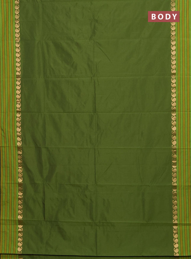 Arani semi silk saree sap green and mustard yellow with plain body and paisley zari woven simple border