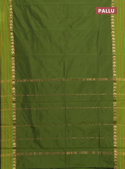 Arani semi silk saree sap green and mustard yellow with plain body and paisley zari woven simple border