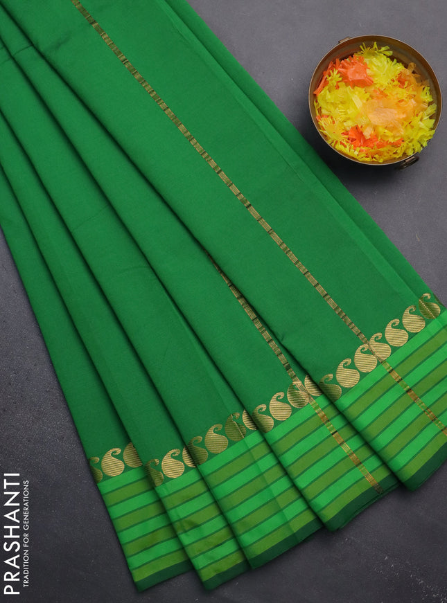 Arani semi silk saree green and light green with plain body and paisley zari woven simple border