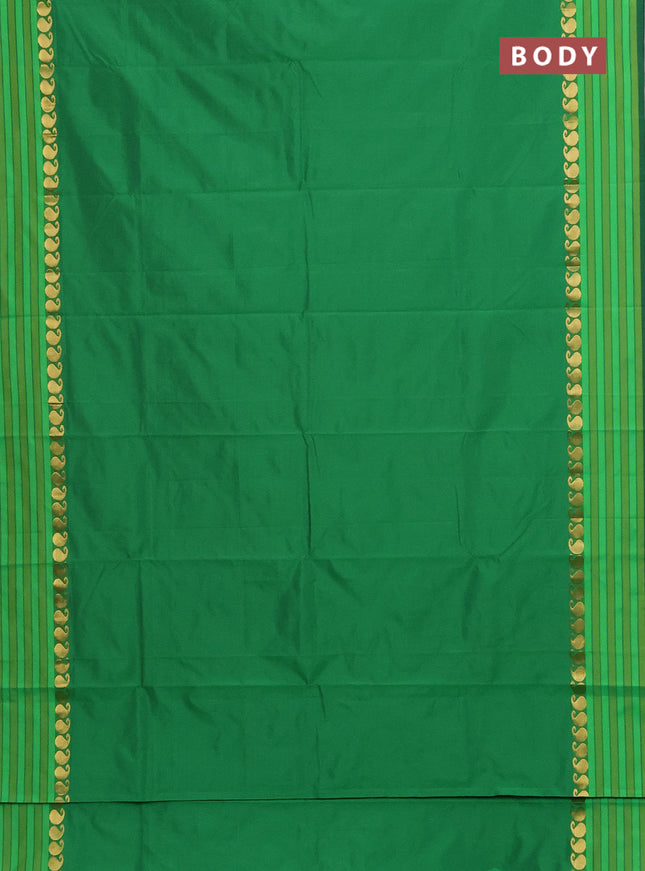 Arani semi silk saree green and light green with plain body and paisley zari woven simple border