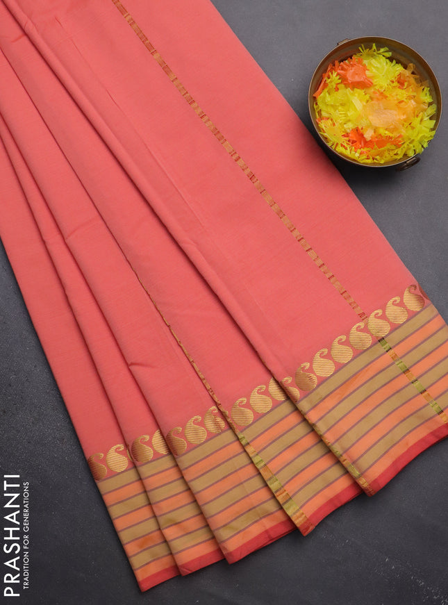 Arani semi silk saree peach orange and yellow shade with plain body and paisley zari woven simple border