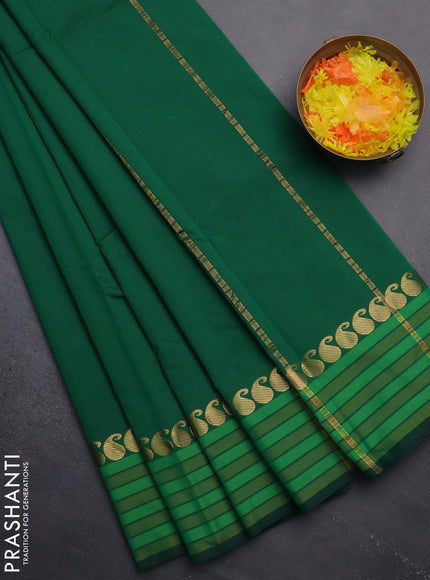 Arani semi silk saree green and light green with plain body and paisley zari woven simple border