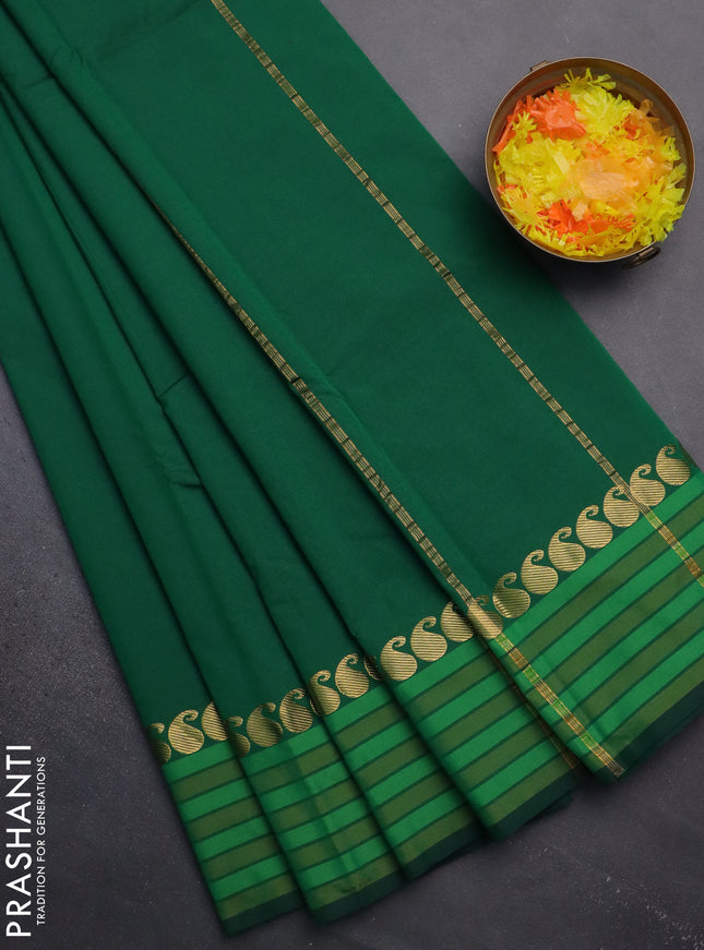 Arani semi silk saree green and light green with plain body and paisley zari woven simple border
