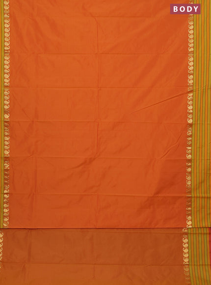 Arani semi silk saree dual shade of mustard yellow and light green with plain body and paisley zari woven simple border