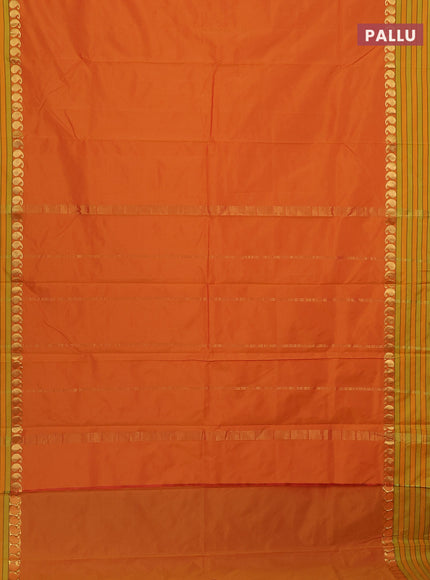 Arani semi silk saree dual shade of mustard yellow and light green with plain body and paisley zari woven simple border