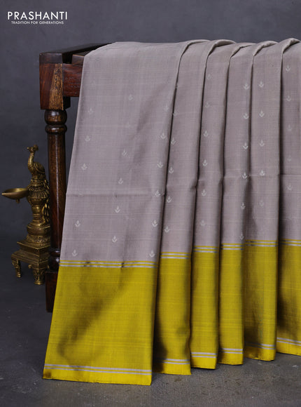 Pure soft silk saree grey and yellow with silver zari woven buttas and rettapet zari woven border