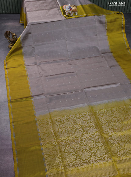 Pure soft silk saree grey and yellow with silver zari woven buttas and rettapet zari woven border