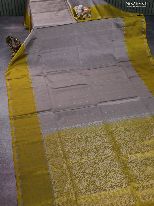Pure soft silk saree grey and yellow with silver zari woven buttas and rettapet zari woven border