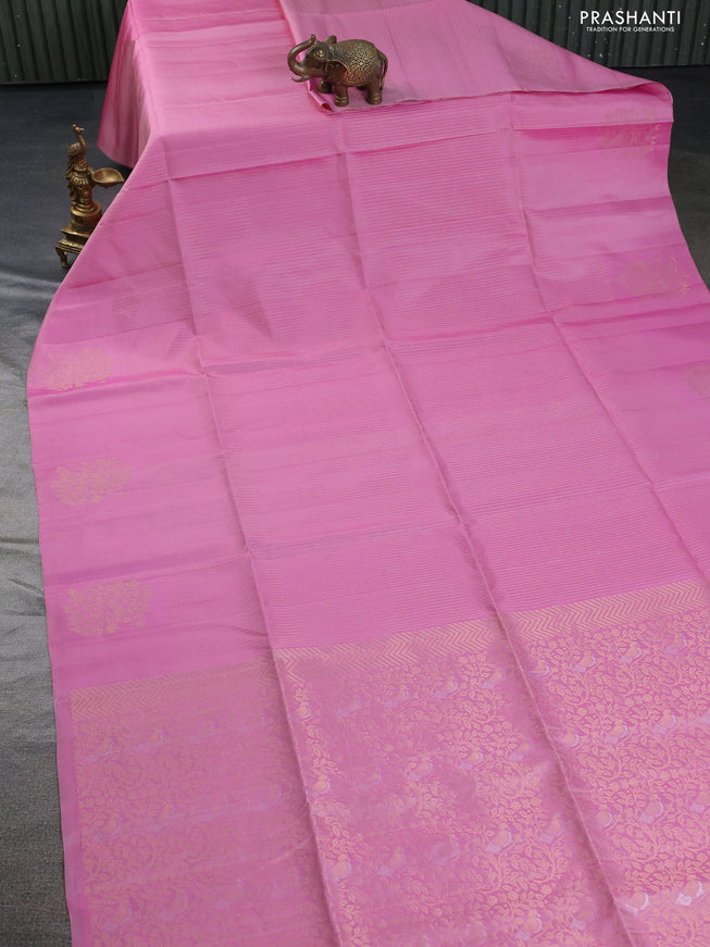 Pure soft silk saree light pink with allover zari weaves and zari woven butta border