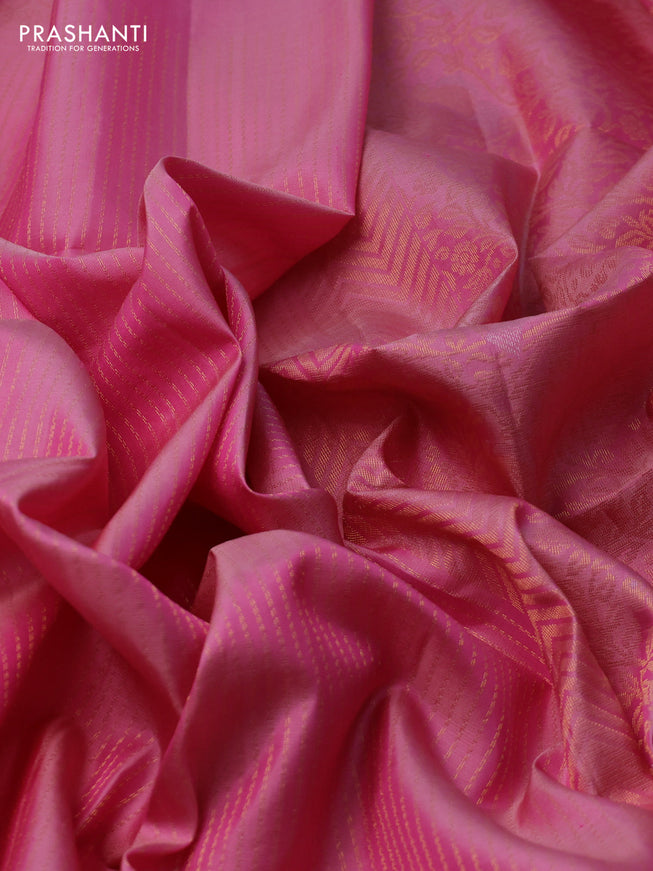 Pure soft silk saree light pink with allover zari weaves and zari woven butta border