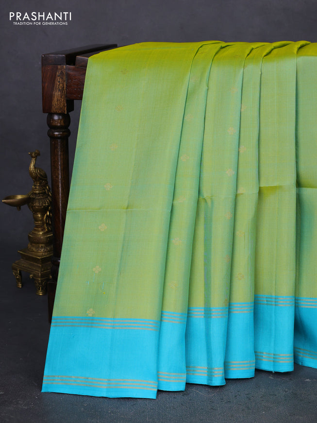 Pure soft silk saree light green and teal blue with zari woven buttas and rettapet zari woven border