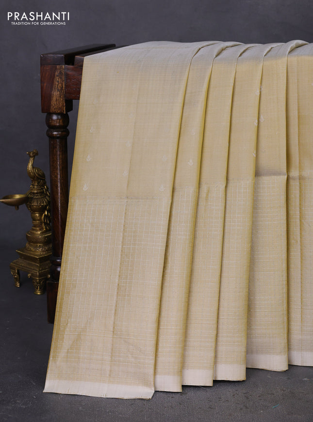 Pure soft silk saree beige with allover zari woven buttas and zari woven border