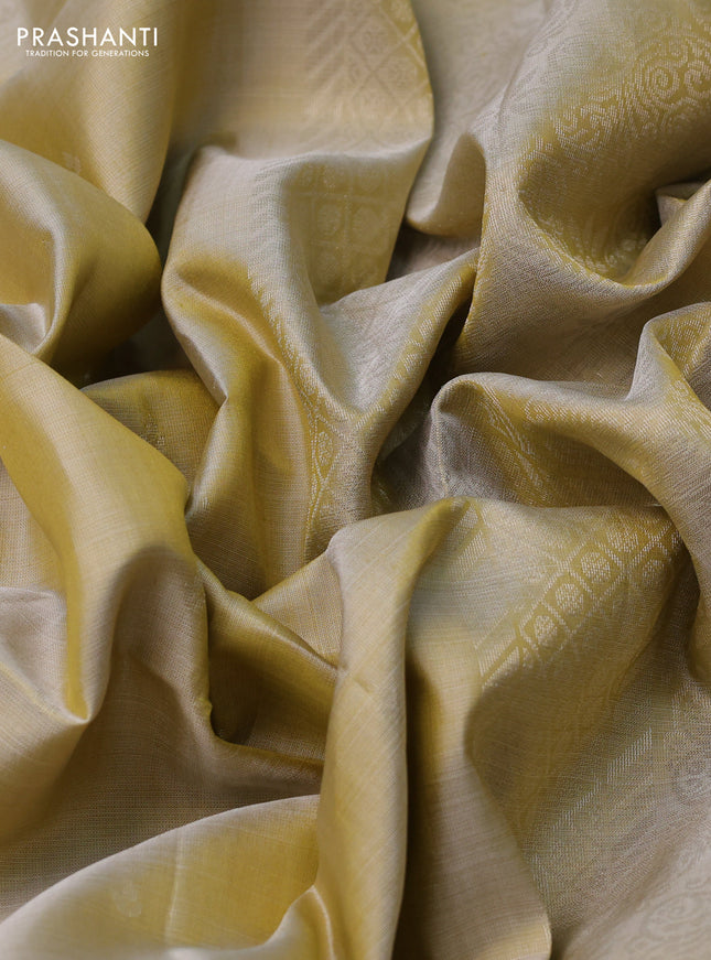 Pure soft silk saree beige with allover zari woven buttas and zari woven border