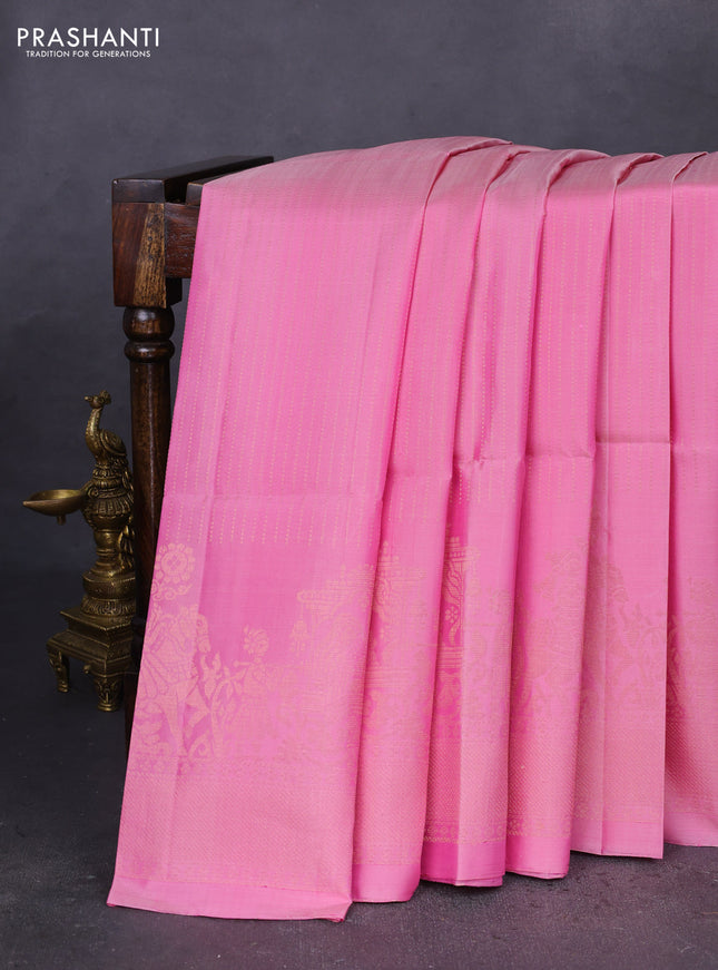 Pure soft silk saree light pink with allover zari weaves and long rich zari woven border