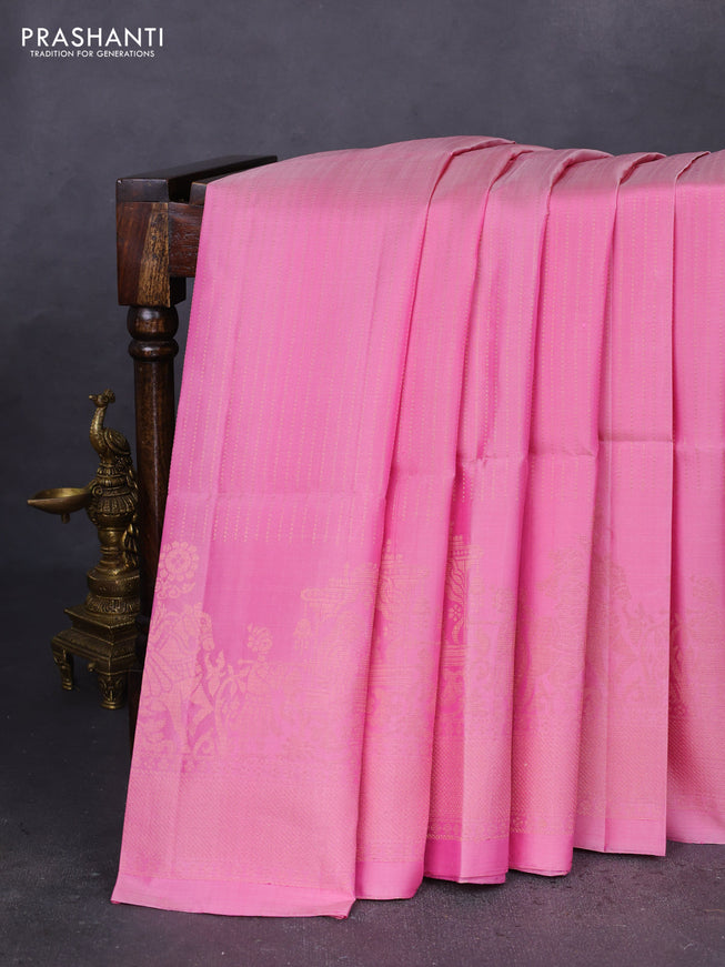Pure soft silk saree light pink with allover zari weaves and long rich zari woven border