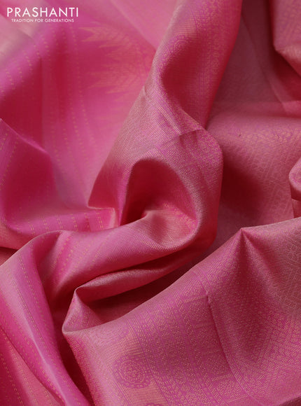 Pure soft silk saree light pink with allover zari weaves and long rich zari woven border