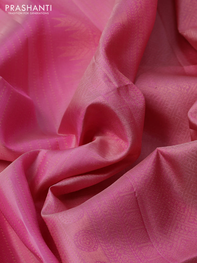 Pure soft silk saree light pink with allover zari weaves and long rich zari woven border