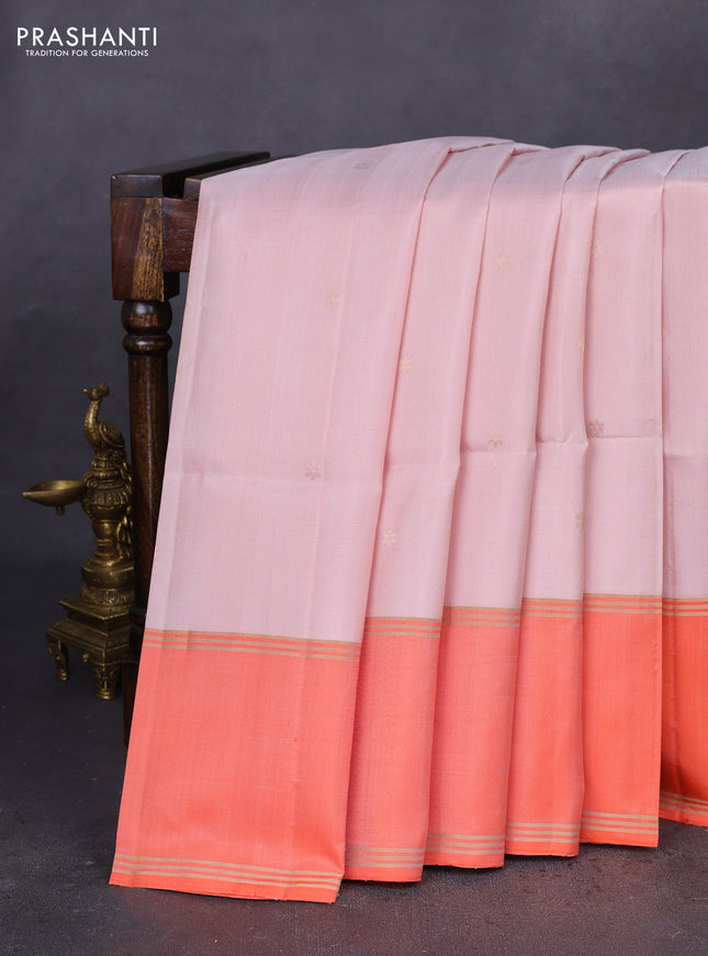 Pure soft silk saree pastel peach and orange with zari woven floral buttas and rettapet zari woven border