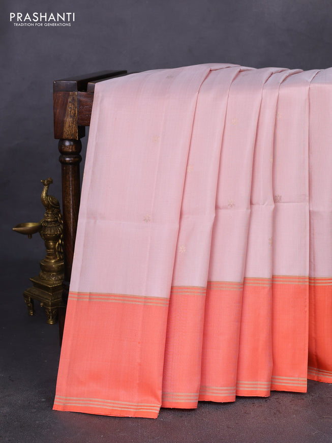 Pure soft silk saree pastel peach and orange with zari woven floral buttas and rettapet zari woven border