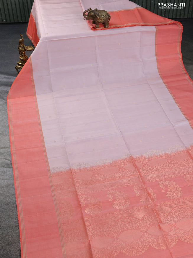 Pure soft silk saree pastel peach and orange with zari woven floral buttas and rettapet zari woven border