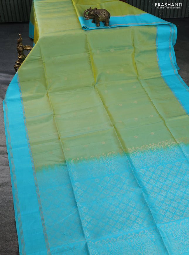 Pure soft silk saree dual shade of light green and teal blue with zari woven floral buttas and rettapet zari woven border