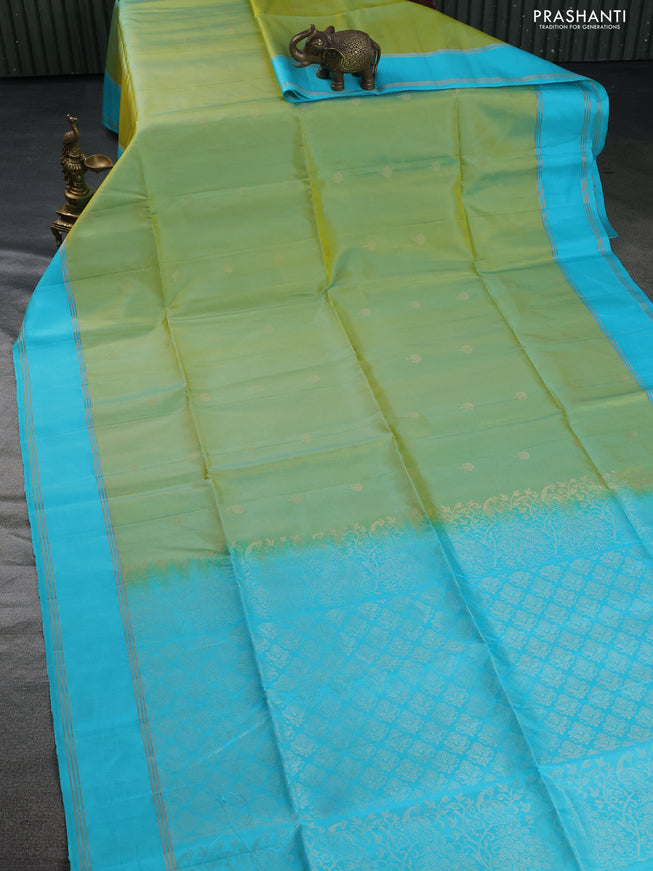 Pure soft silk saree dual shade of light green and teal blue with zari woven floral buttas and rettapet zari woven border