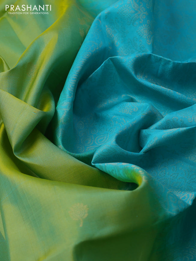 Pure soft silk saree dual shade of light green and teal blue with zari woven floral buttas and rettapet zari woven border