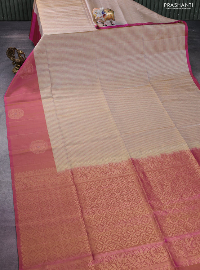 Pure soft silk saree sandal and dual shade of pink with allover thread checked pattern and long zari woven butta border
