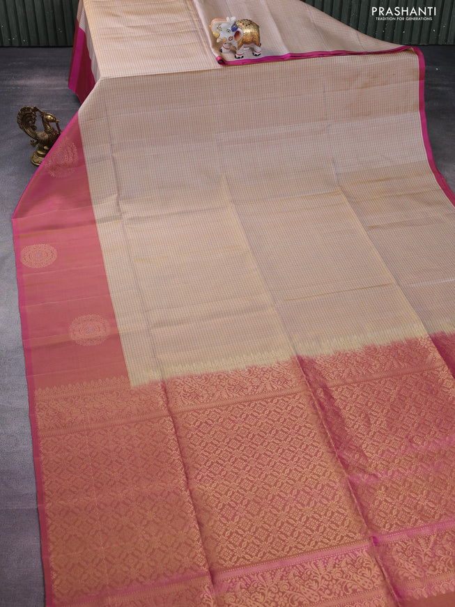 Pure soft silk saree sandal and dual shade of pink with allover thread checked pattern and long zari woven butta border