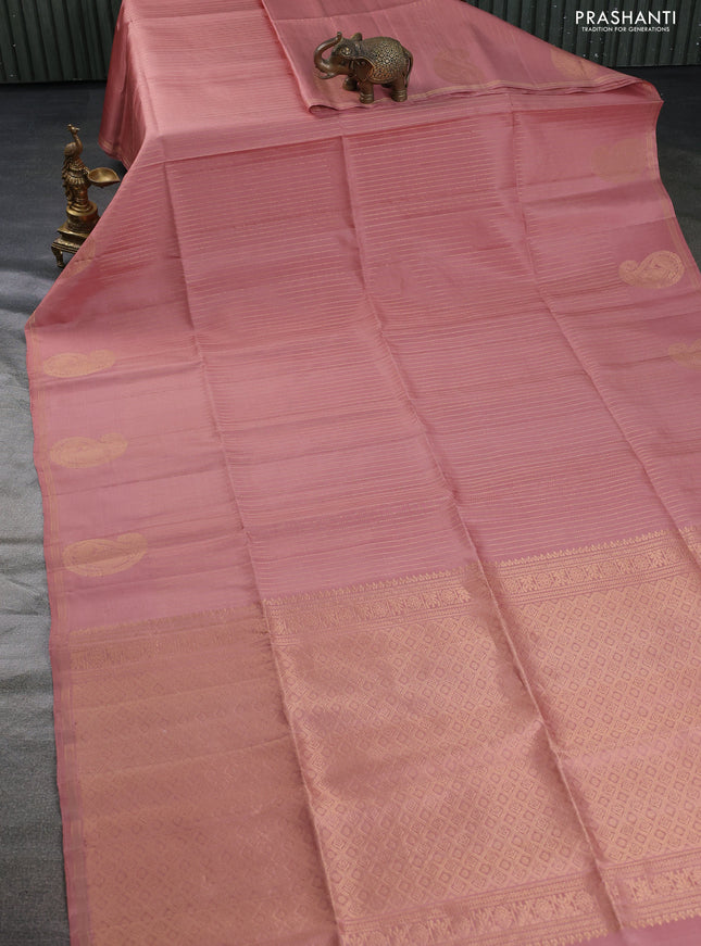 Pure soft silk saree pastel peach with allover zari weaves and zari woven butta border