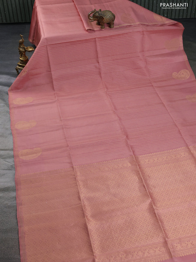 Pure soft silk saree pastel peach with allover zari weaves and zari woven butta border