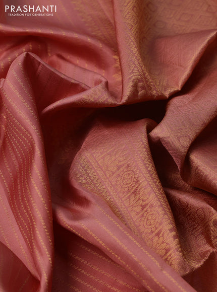 Pure soft silk saree pastel peach with allover zari weaves and zari woven butta border