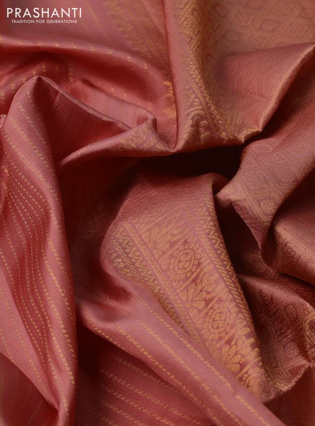 Pure soft silk saree pastel peach with allover zari weaves and zari woven butta border