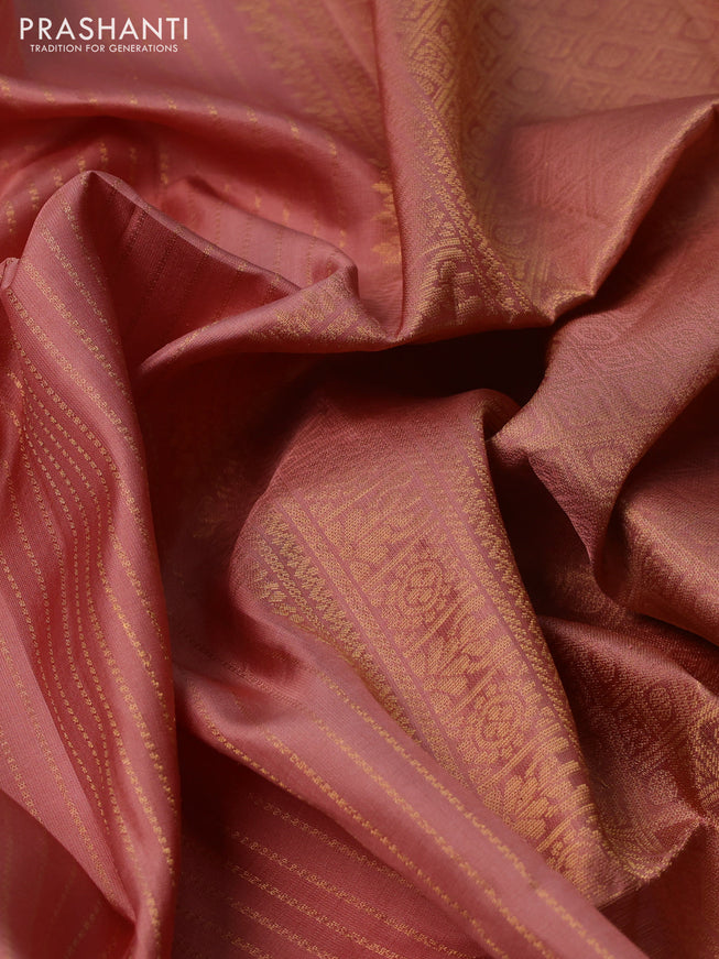 Pure soft silk saree pastel peach with allover zari weaves and zari woven butta border
