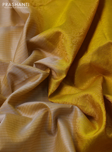 Pure soft silk saree beige and yellow with allover zari checked pattern and rettapet zari woven border