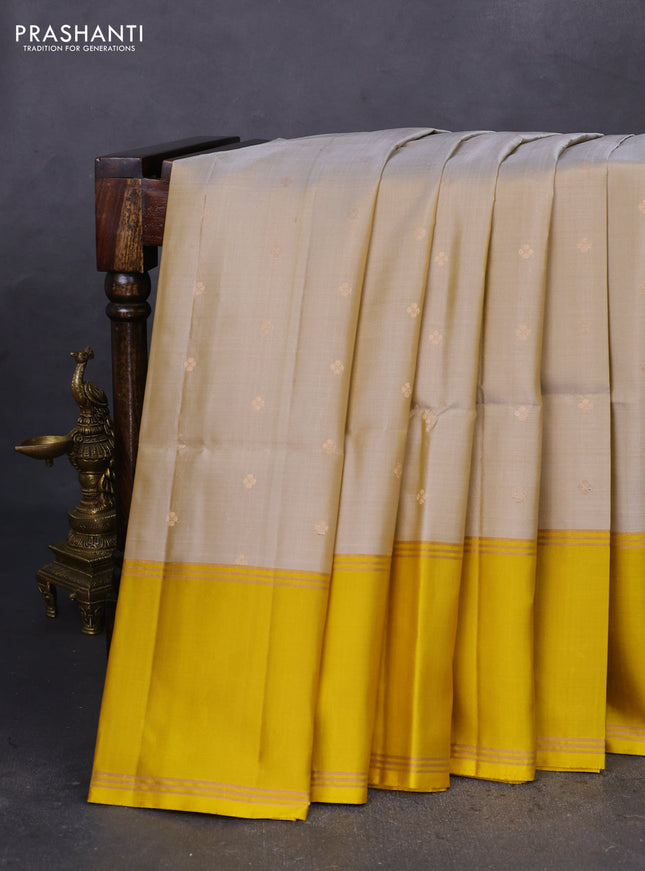 Pure soft silk saree beige and mustard yellow with zari woven buttas and rettapet zari woven border