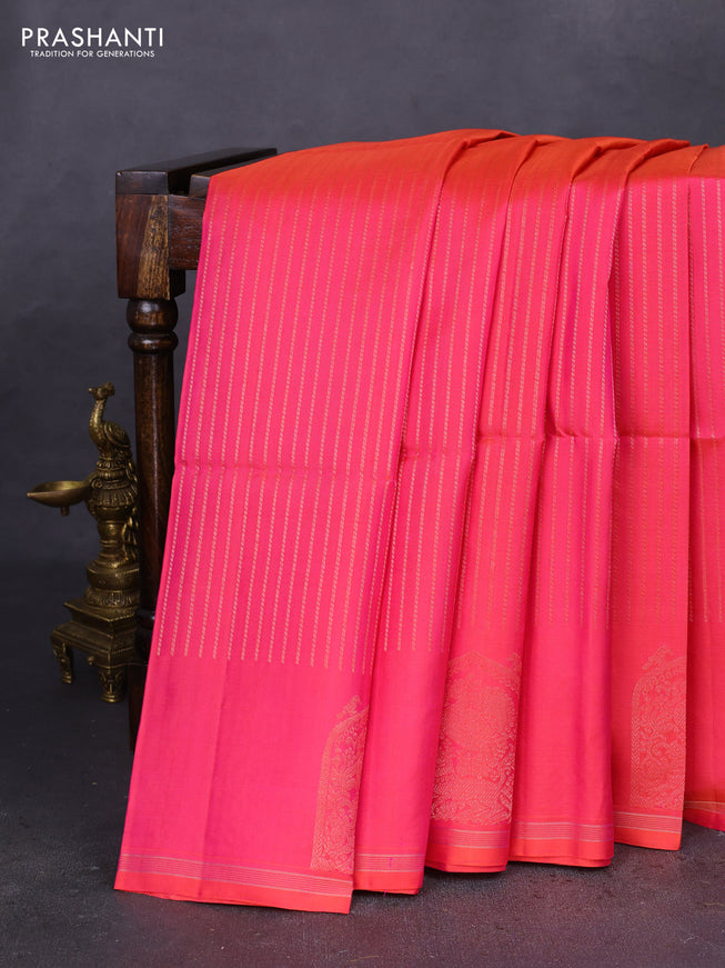 Pure soft silk saree dual shade of pinkish orange with allover zari weaves and zari woven butta border