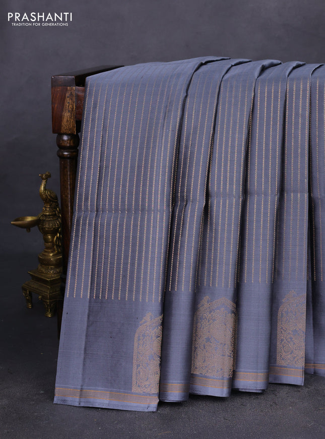 Pure soft silk saree grey with allover zari weaves and zari woven butta border