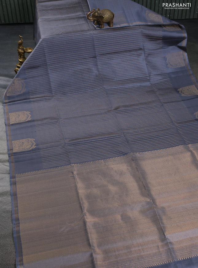 Pure soft silk saree grey with allover zari weaves and zari woven butta border