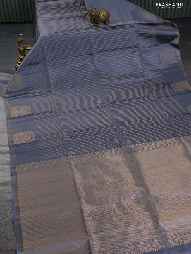 Pure soft silk saree grey with allover zari weaves and zari woven butta border