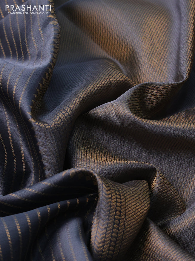 Pure soft silk saree grey with allover zari weaves and zari woven butta border