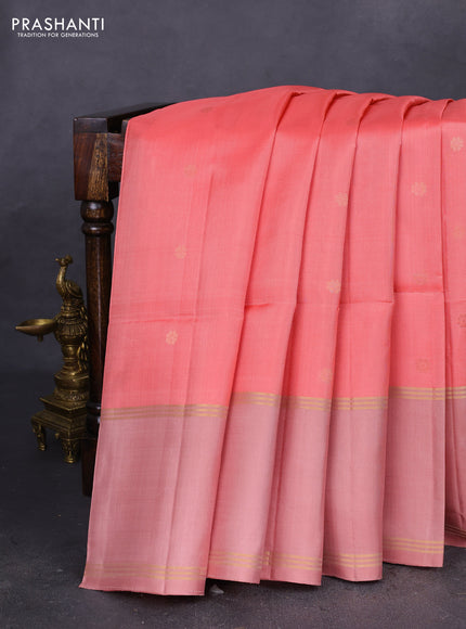 Pure soft silk saree peach pink and pastel peach with zari woven floral buttas and rettapet zari woven border
