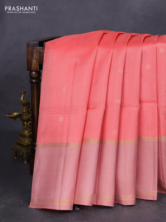 Pure soft silk saree peach pink and pastel peach with zari woven floral buttas and rettapet zari woven border