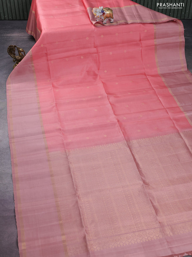 Pure soft silk saree peach pink and pastel peach with zari woven floral buttas and rettapet zari woven border
