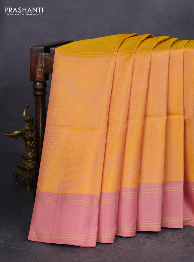 Pure soft silk saree mustard yellow and pastel peach with allover zari checked pattern and rettapet zari woven border
