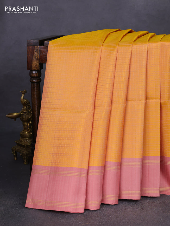 Pure soft silk saree mustard yellow and pastel peach with allover zari checked pattern and rettapet zari woven border