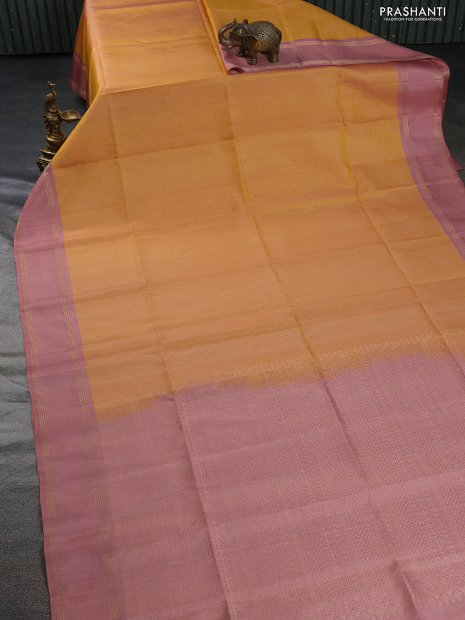 Pure soft silk saree mustard yellow and pastel peach with allover zari checked pattern and rettapet zari woven border