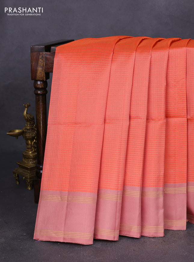 Pure soft silk saree peach shade and pastel peach with allover zari checked pattern and rettapet zari woven border