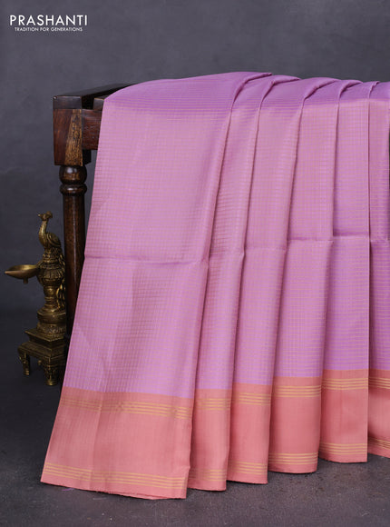 Pure soft silk saree pastel lavender and pastel peach with allover zari checked pattern and rettapet zari woven border