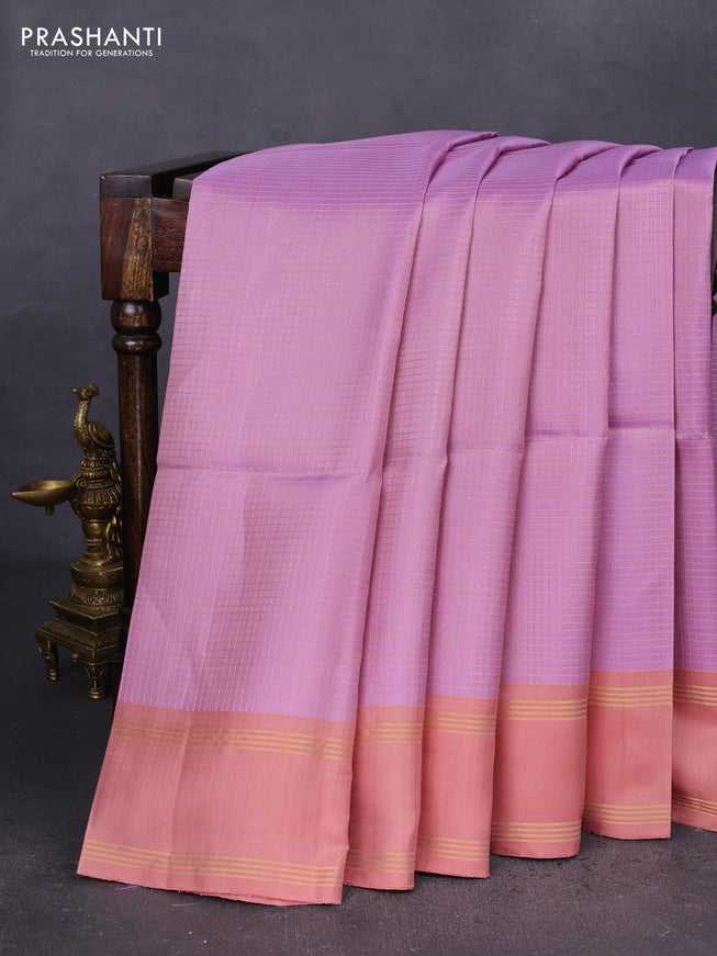 Pure soft silk saree pastel lavender and pastel peach with allover zari checked pattern and rettapet zari woven border